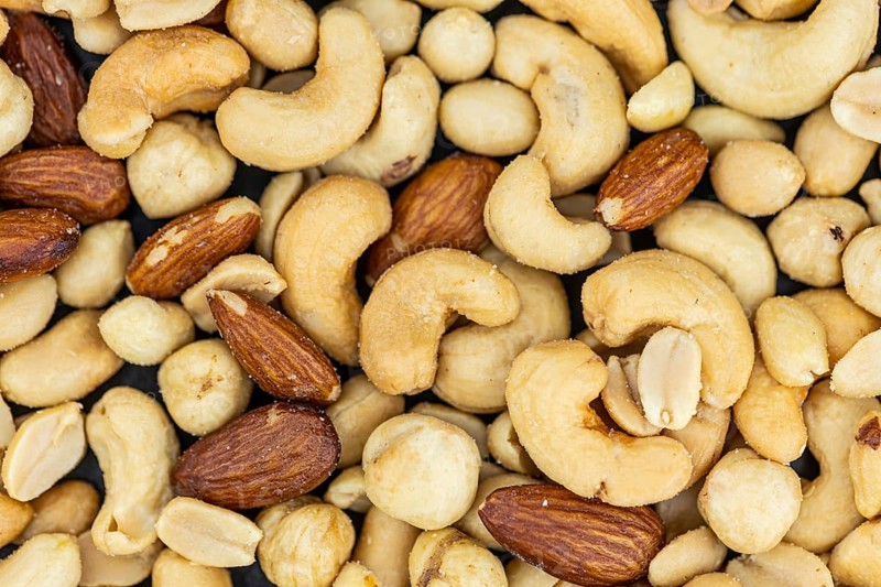 Roasted and salted nuts for use as background image or as texture (close up shot)
