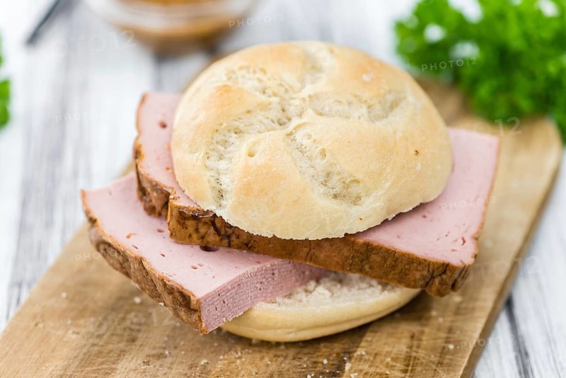 Homemade Meat Loaf on vintage background (selective focus, close-up shot)