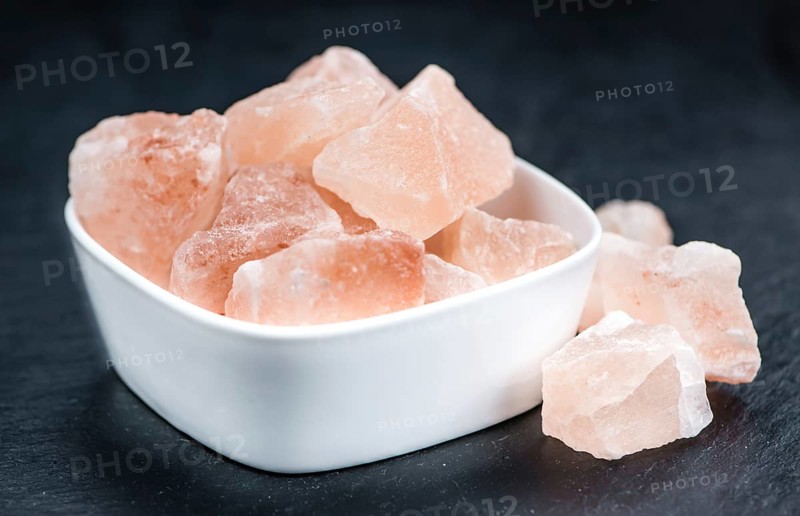 Portion of pink himalayan Salt (detailed close-up shot, selective focus)