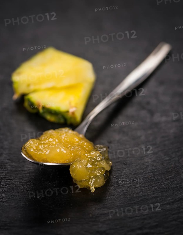 Some homemade Pineapple Jam as detailed close-up shot, selective focus