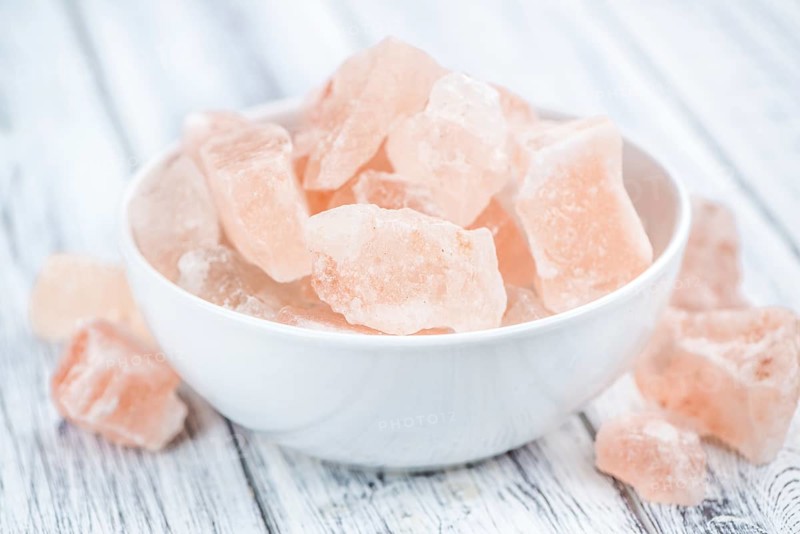 Portion of pink himalayan Salt (detailed close-up shot, selective focus)