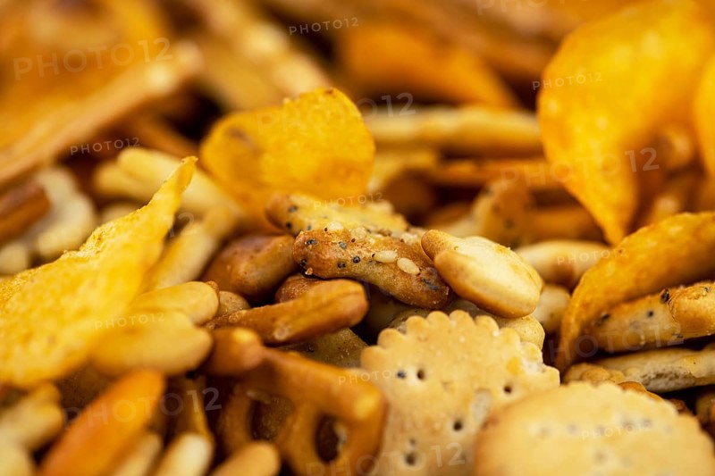 Portion of mixed Snacks (detailed close up shot, selective focus)