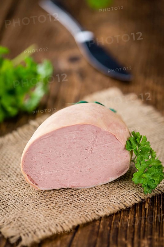 Portion of fresh made Liverwurst (close-up shot, selective focus)
