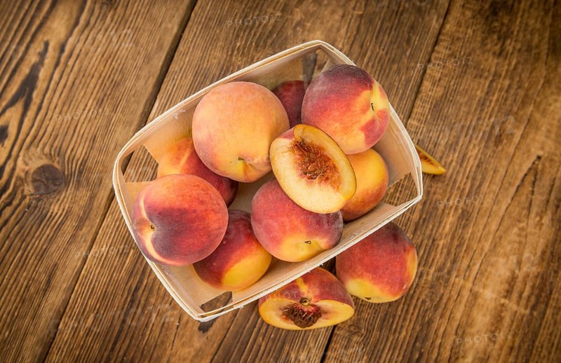 Portion of fresh Peaches close-up shot, selective focus