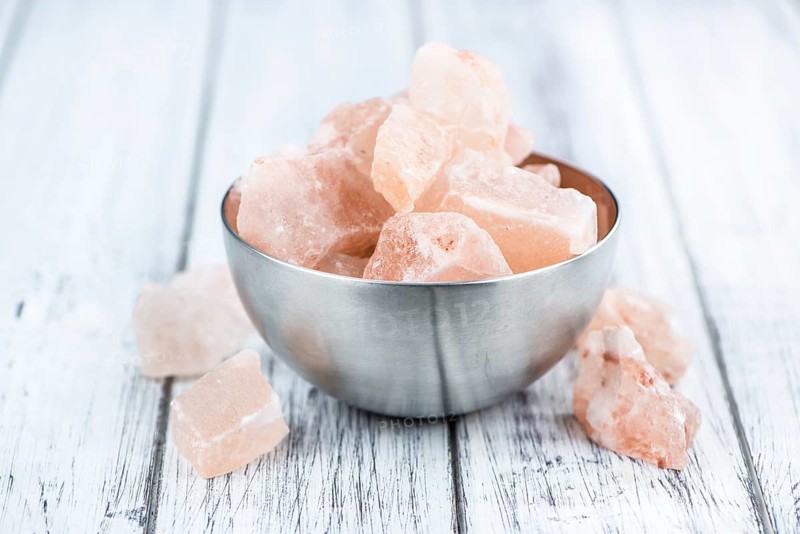 Portion of pink himalayan Salt (detailed close-up shot, selective focus)