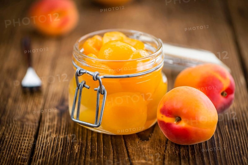 Portion of fresh pickled Apricots (close-up shot, selective focus)