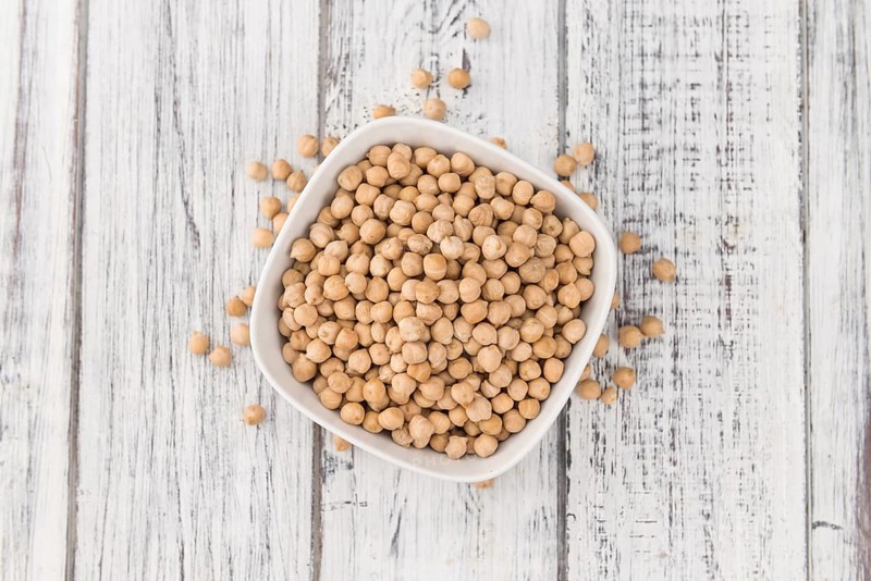 Portion of fresh Chickpeas close-up shot, selective focus