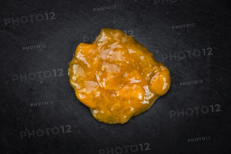 Some homemade Apricot Jam (selective focus) as detailed close-up shot