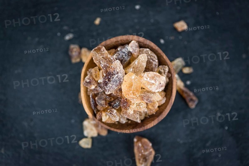 Portion of brown Rock Candy as detailed close-up shot (selective focus)