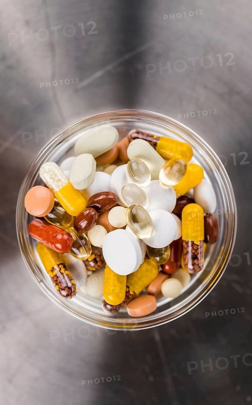 Mixed sorts of drugs as detailed close-up shot (selective focus)