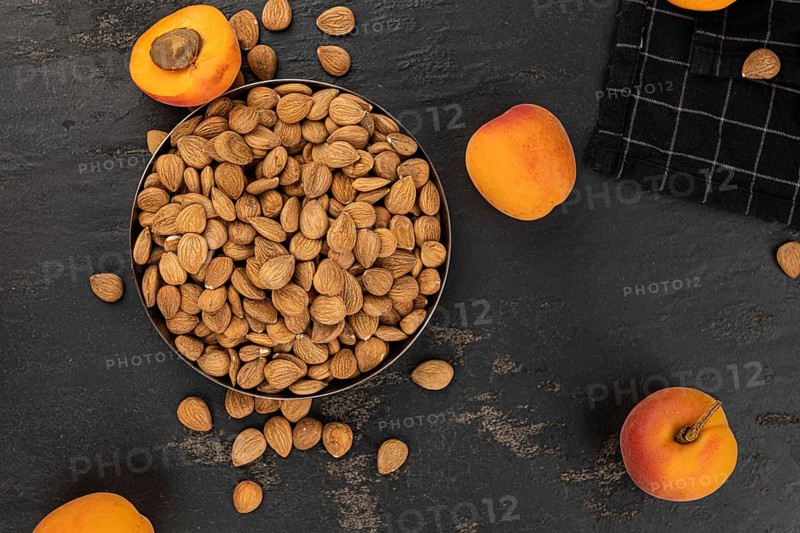 Some shelled Apricot Kernels as detailed close up shot (selective focus)