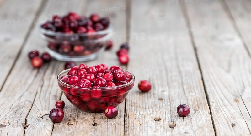 Portion of healthy Cranberries (preserved) (selective focus, close-up shot)