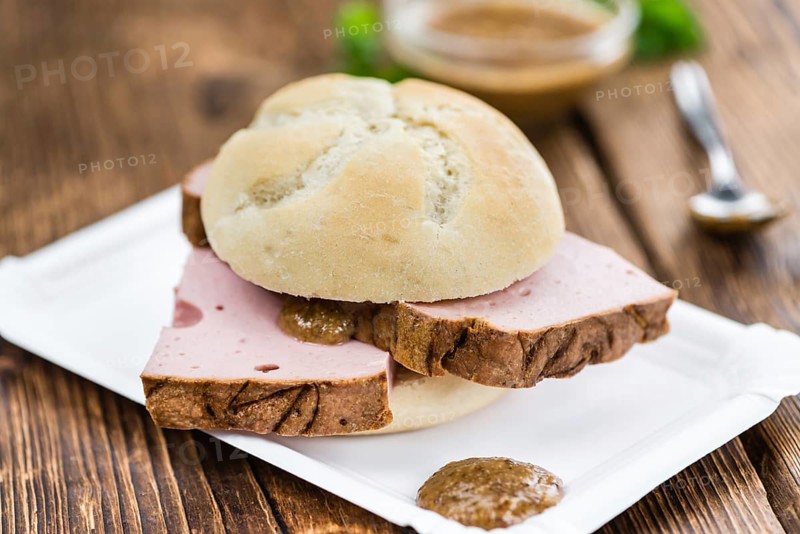 Meat Loaf on rustic wooden background (close-up shot)
