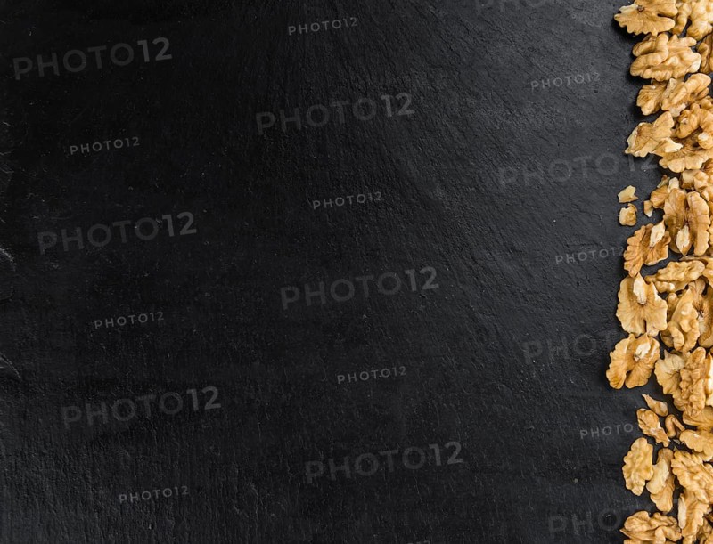Portion of fresh Walnut kernels (close-up shot, selective focus)