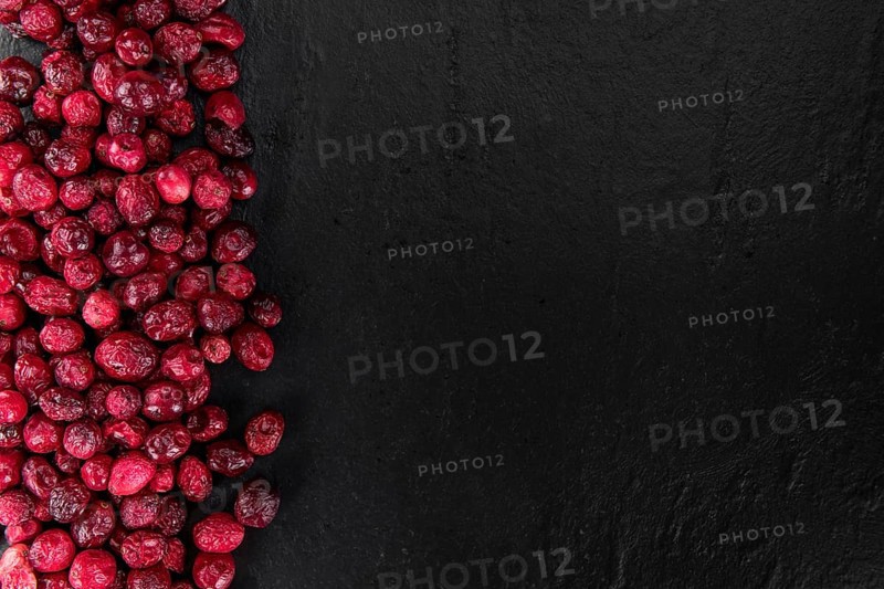 Portion of healthy Dried Cranberries (selective focus, close-up shot)