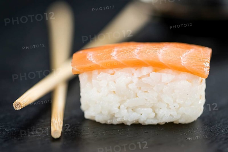 Fresh made Sushi (selective focus) on a vintage looking slate slab