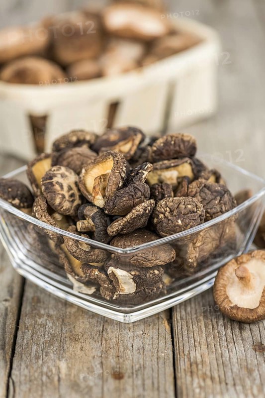 Some homemade Shiitake mushrooms (dried) as detailed close-up shot, selective focus
