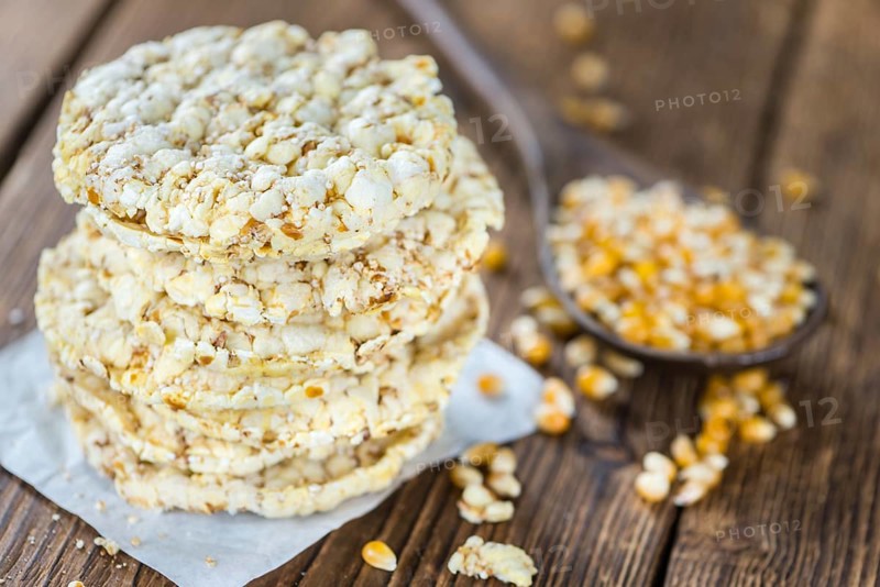 Some fresh made Corn Waffles on wooden background (selective focus)