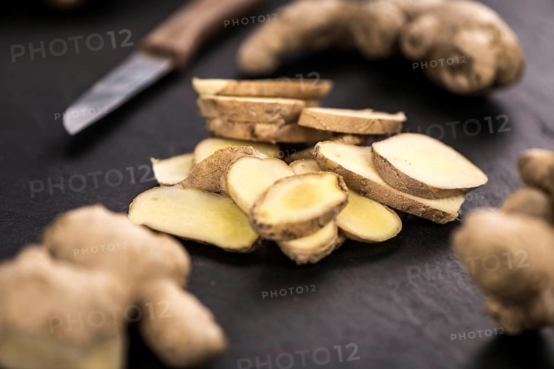 Some fresh Ginger Slices (selective focus, close-up shot)