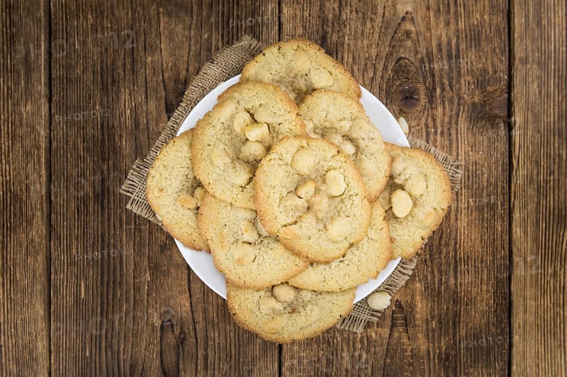 Portion of Macadamia Cookies as detailed close-up shot, selective focus