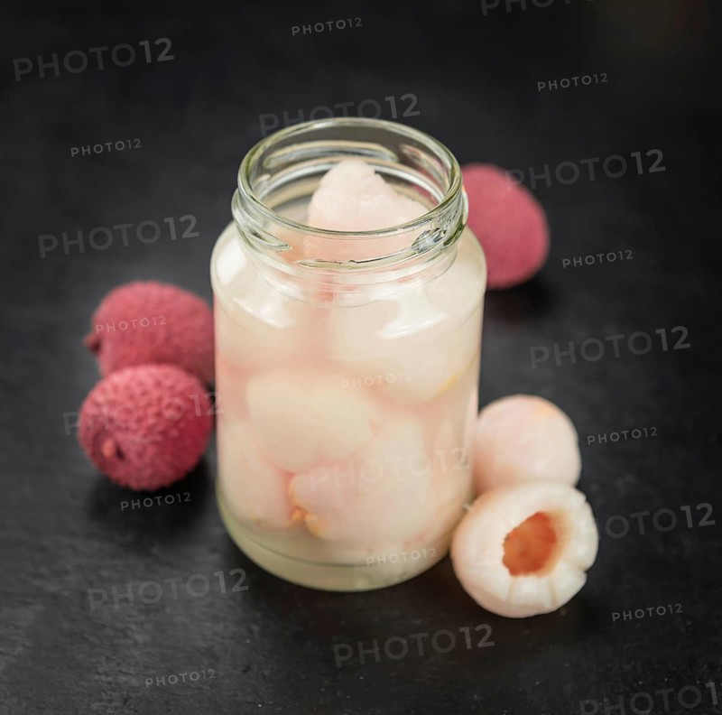 Preserved Lychees on a vintage background as detailed close-up shot (selective focus)