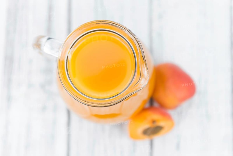 Some homemade Apricot Juice (selective focus) as detailed close-up shot