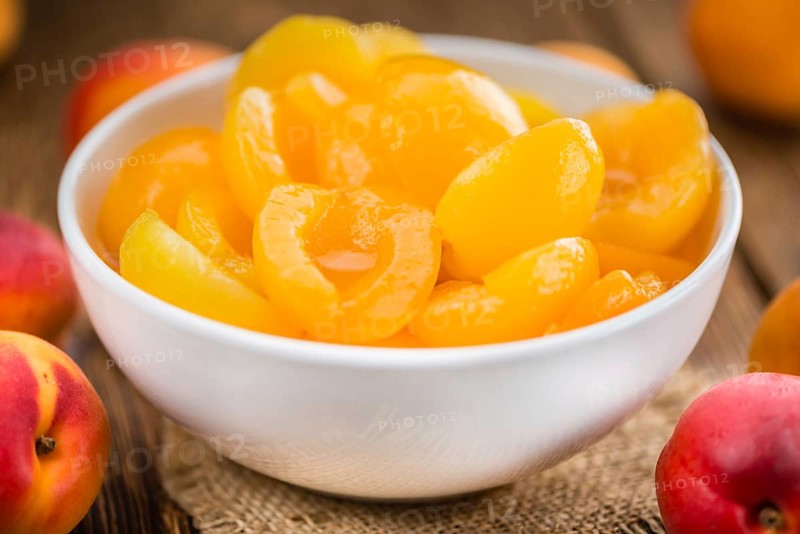 Portion of fresh pickled Apricots (close-up shot, selective focus)