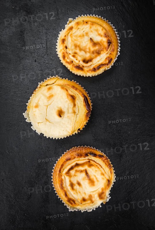 Homemade Cheesecake on vintage background (selective focus, close-up shot)