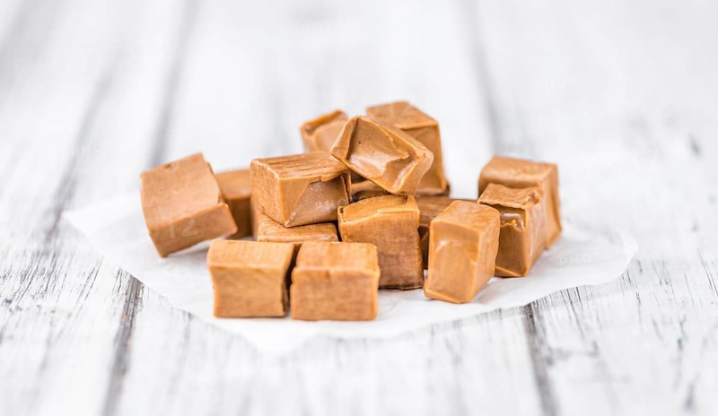 Portion of fresh Caramel (close-up shot, selective focus)