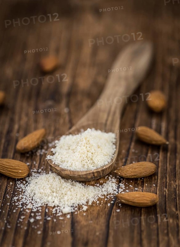 Ground Almonds (fresh) as detailed close-up shot, selective focus