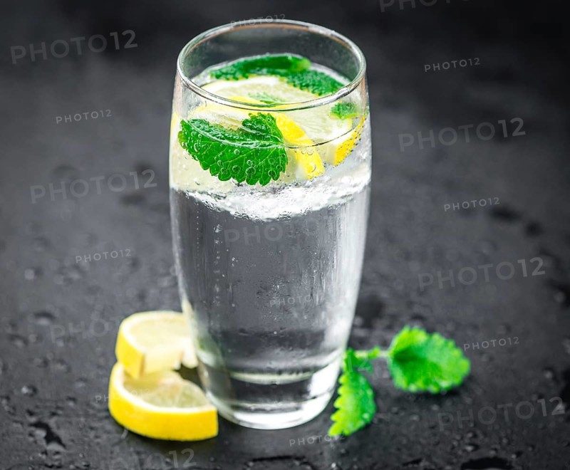 Homemade Lemonade on vintage background (selective focus, close-up shot)