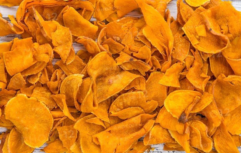Sweet Potato Chips on a vintage background as detailed close-up shot, selective focus
