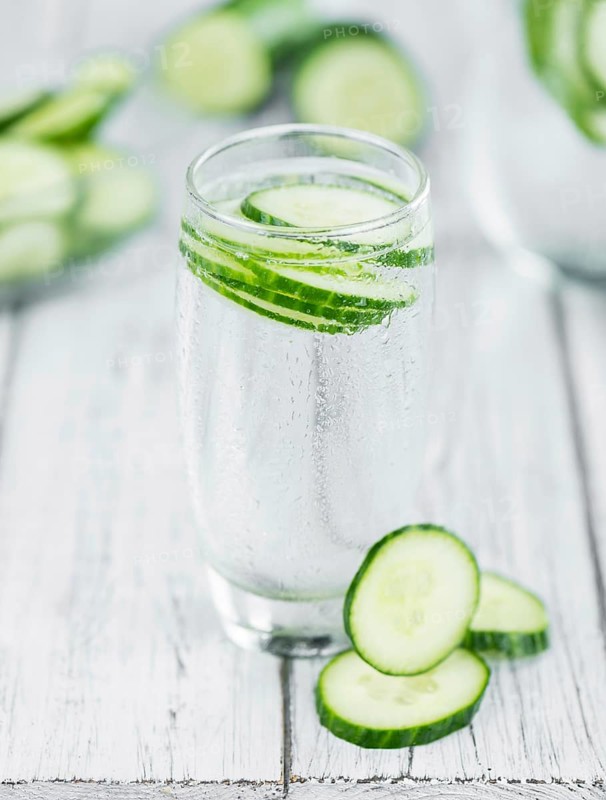 Cucumber Water on a vintage background as detailed close-up shot, selective focus