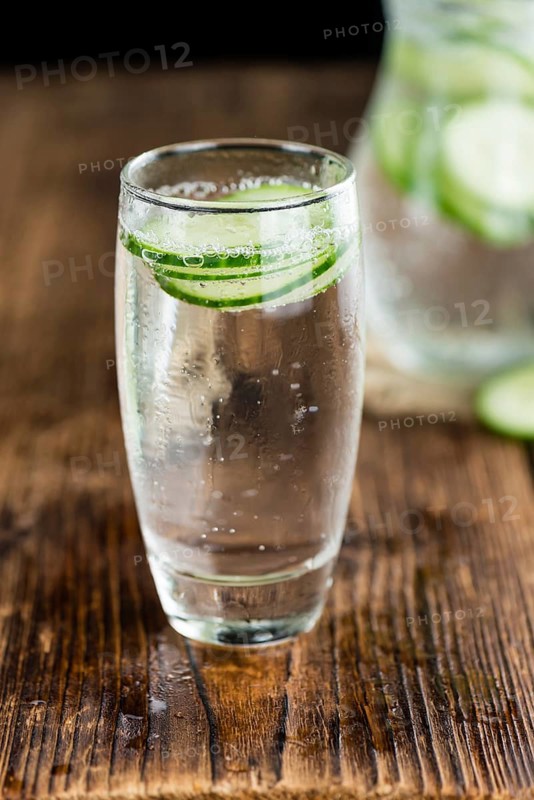 Cucumber Water on a vintage background as detailed close-up shot, selective focus