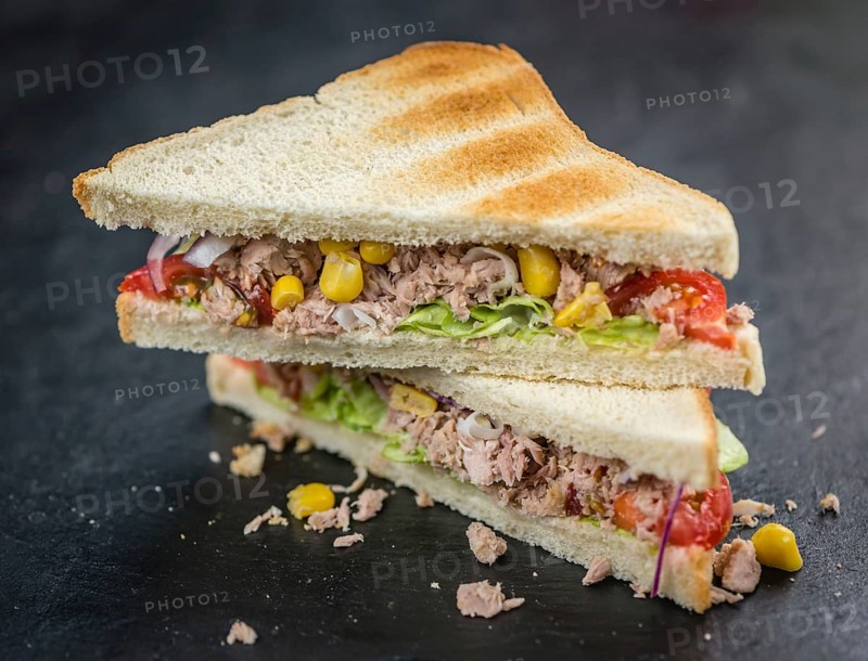 Tuna Sandwich (selective focus, close-up shot) on vintage background