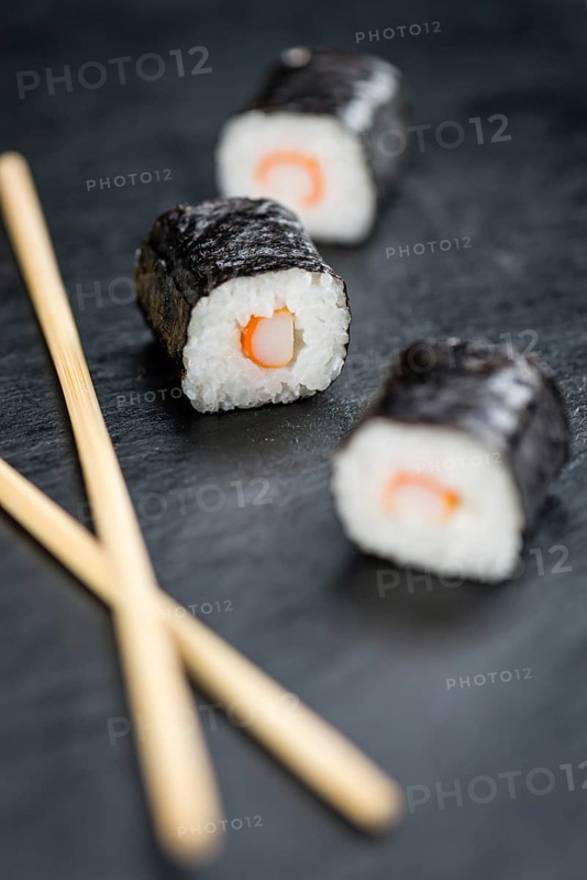 Fresh made Sushi (selective focus) on a vintage looking slate slab