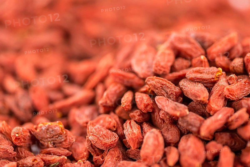 Goji Berries on a vintage background as detailed close-up shot (selective focus)