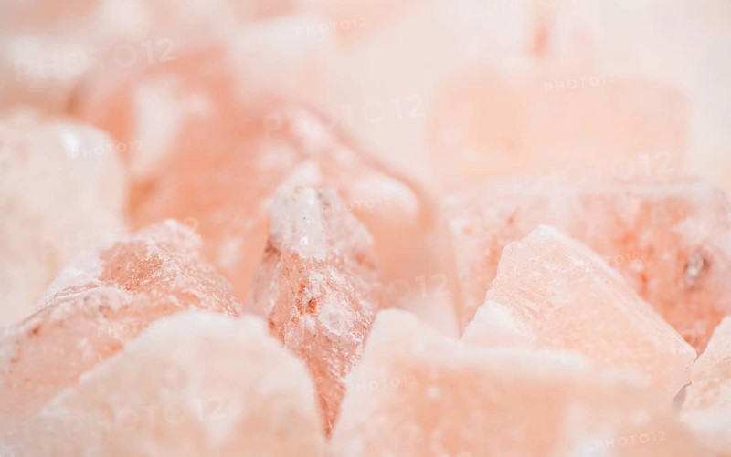 Portion of pink himalayan Salt (detailed close-up shot, selective focus)
