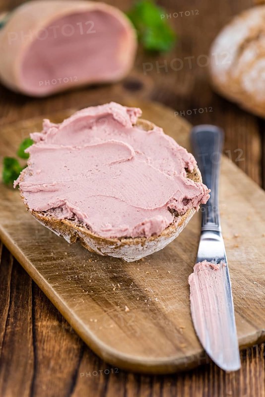 Fresh made Sandwich with Liverwurst on a vintage background (close-up shot)
