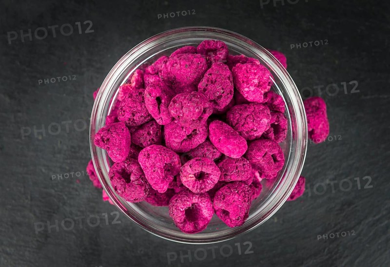 Some homemade Raspberries (dried) as detailed close-up shot, selective focus