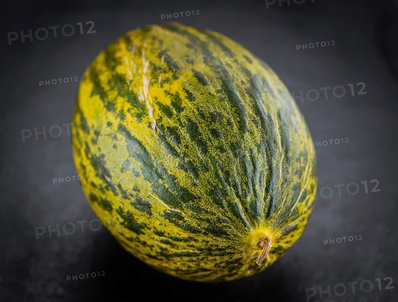 Futuro Melons on a vintage slate slab (close-up shot, selective focus)