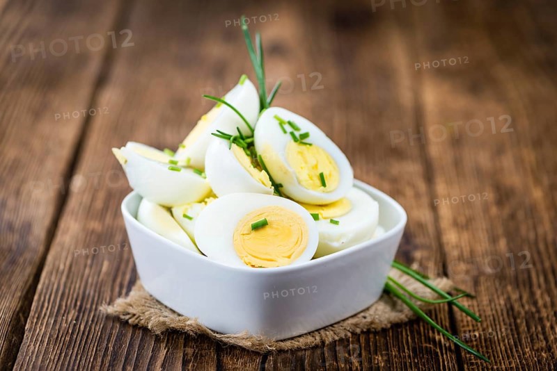 Portion of halved Eggs as detailed close-up shot (selective focus)