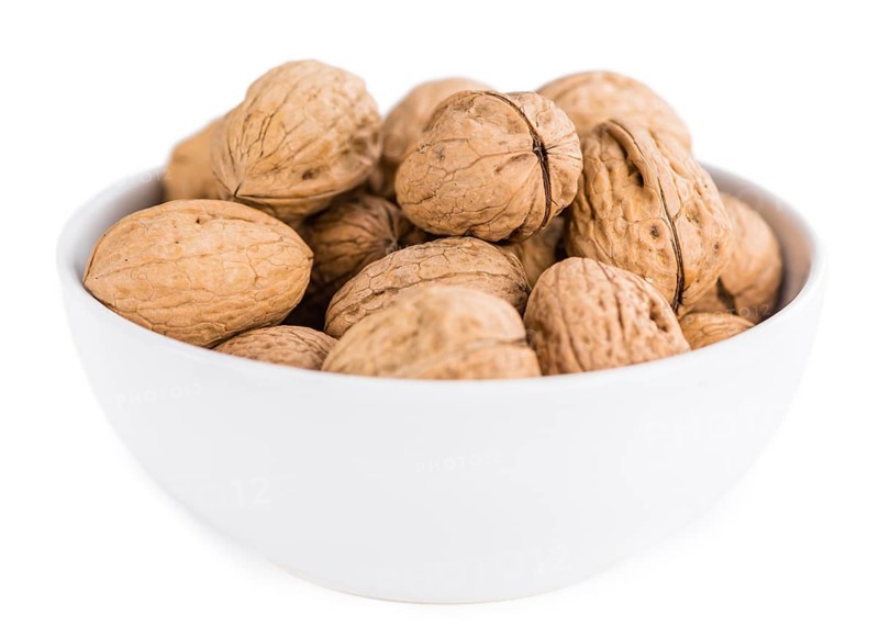 Walnuts isolated on white background (selective focus, close-up shot)