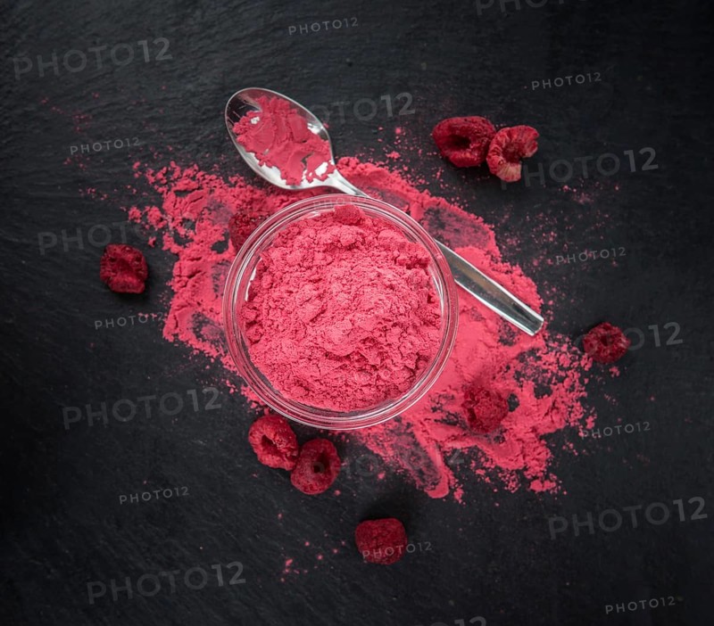 Homemade Ground Raspberries on vintage background selective focus, close-up shot