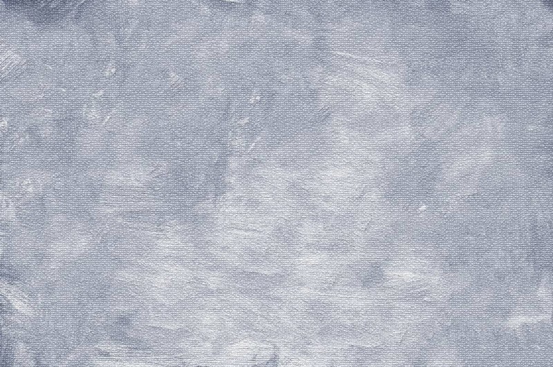 Gray abstract texture with visible brush strokes on a painted canvas, creating a minimalist and rough background, background image