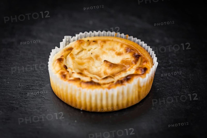 Homemade Cheesecake on vintage background (selective focus, close-up shot)