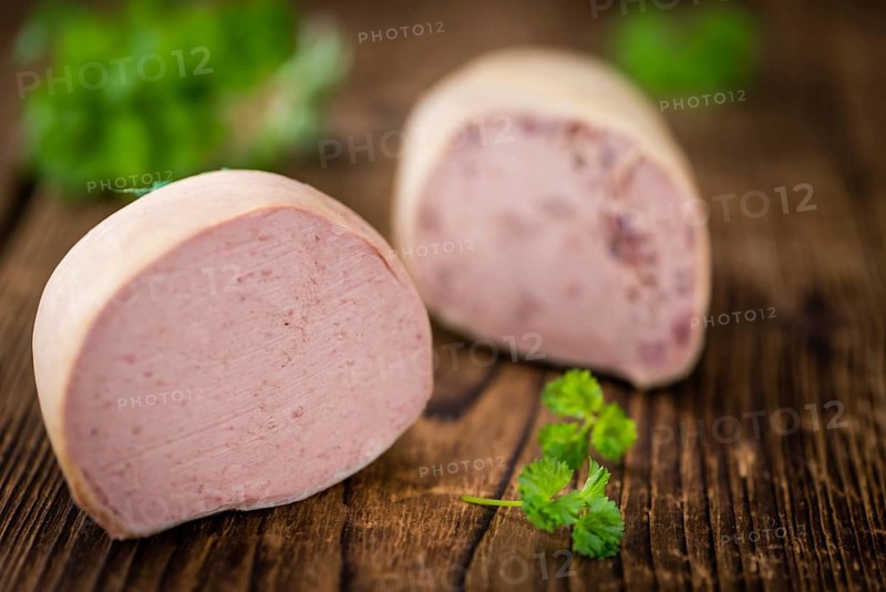 Portion of fresh made Liverwurst (close-up shot, selective focus)