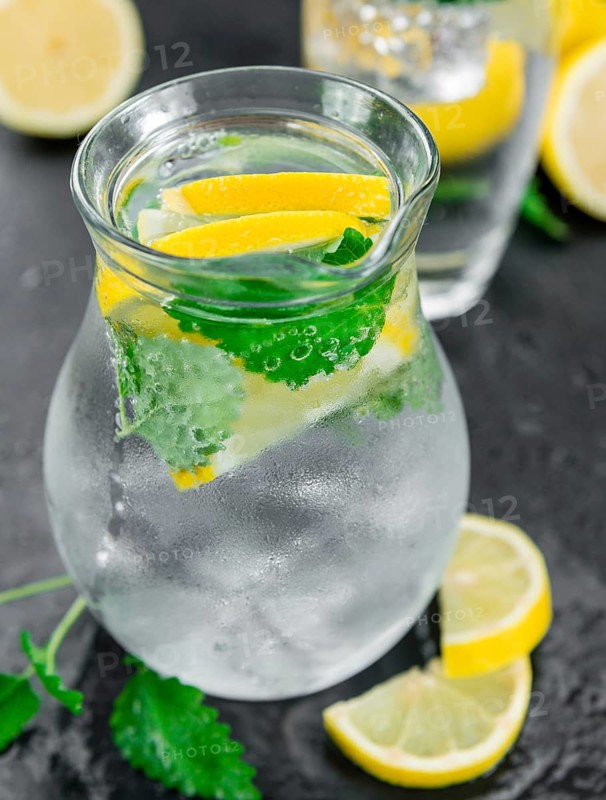 Some Lemonade (with Balm) on a slate slab (close-up shot, selective focus)