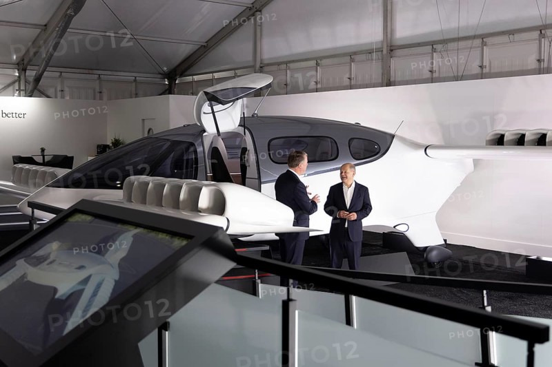 Olaf Scholz (Chancellor of the Federal Republic of Germany, SPD) and Klaus Roewe (CEO of Lilium N.V.) in front of a 36-engine, electrically powered, vertical take-off and landing aircraft from the Dutch company Lilium N.V. during the opening tour of the International Aerospace Exhibition at Berlin ExpoCenter Airport, Berlin, 05.06.2024