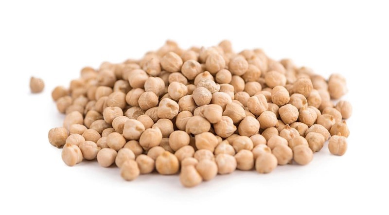 Portion of Chickpeas as detailed close-up shot isolated on white background